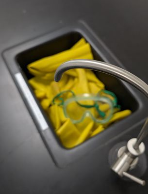 sink full of rubber gloves